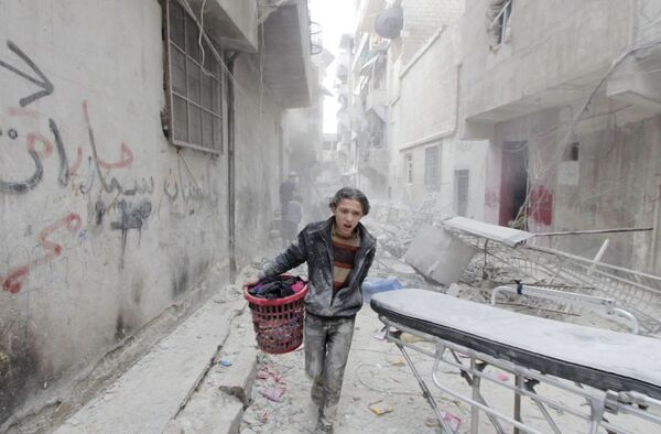 پسر بچه در خیابان حلب بعد از ساختن بمب بیرلی - اسپوتنیک افغانستان  