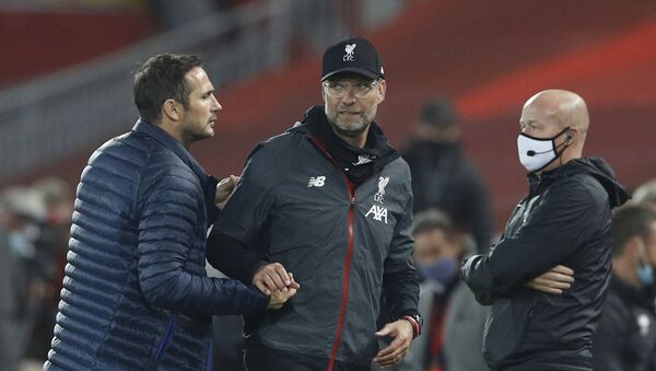 Soccer Football - Premier League - Liverpool v Chelsea - Anfield, Liverpool, Britain - July 22, 2020 Liverpool manager Juergen Klopp shakes hands with Chelsea manager Frank Lampard after the match, as play resumes behind closed doors following the outbreak of the coronavirus disease (COVID-19) - اسپوتنیک افغانستان  