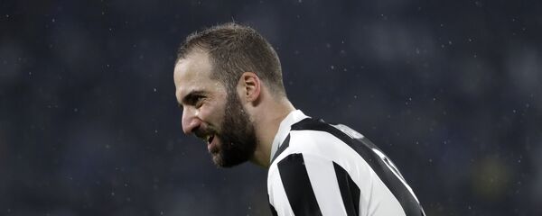 Juventus' Gonzalo Higuain reacts during the Champions League, round of 8, first-leg soccer match between Juventus and Real Madrid at the Allianz stadium in Turin, Italy, Tuesday, April 3, 2018 - اسپوتنیک افغانستان  
