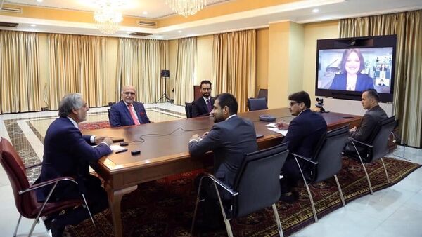 گفتگوی رییس شورای عالی مصالحه با رییس و موسس نهاد ریشه‌های صلح - اسپوتنیک افغانستان  