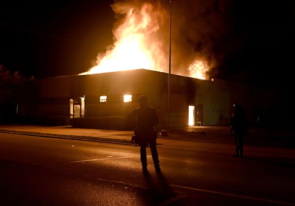  آتش سوری پس از آشوب در ویسکانسین. - اسپوتنیک افغانستان  