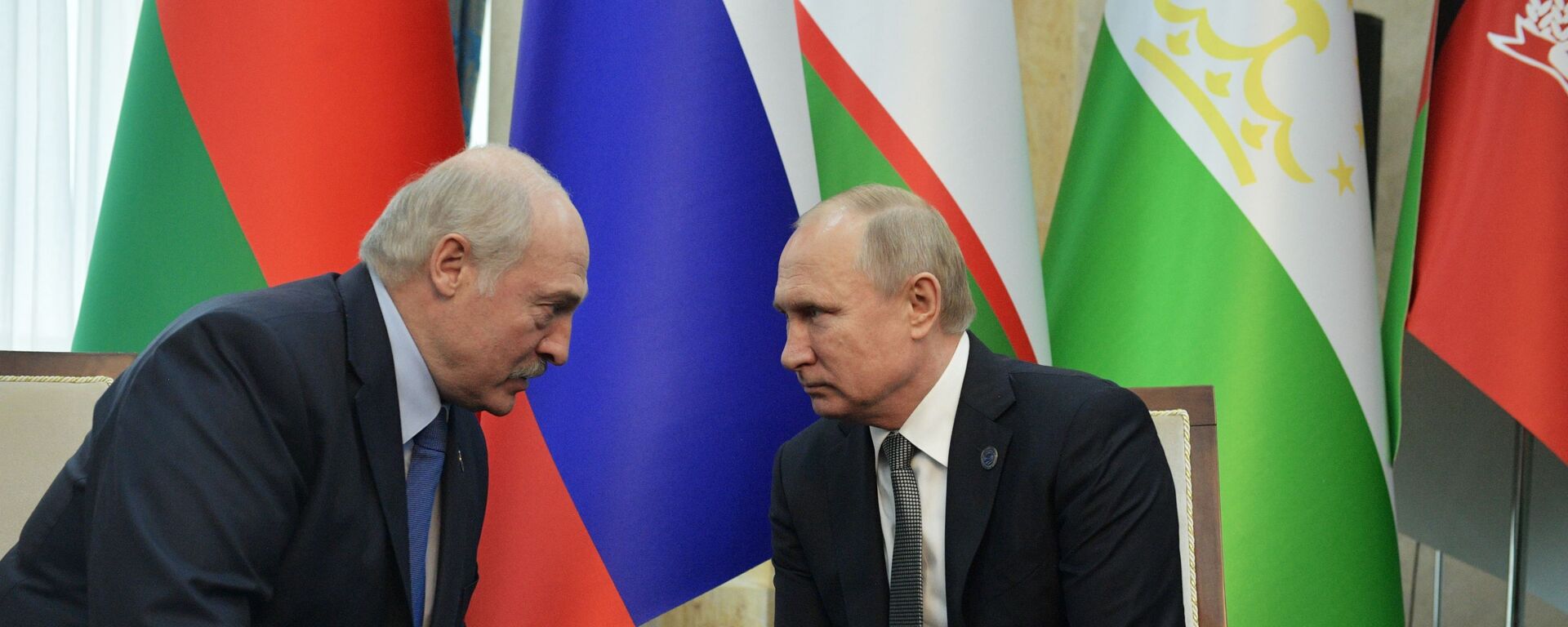 Владимир Путин и президент Белоруссии Александр Лукашенко во время встречи на полях саммита ШОС - اسپوتنیک افغانستان  , 1920, 11.03.2022