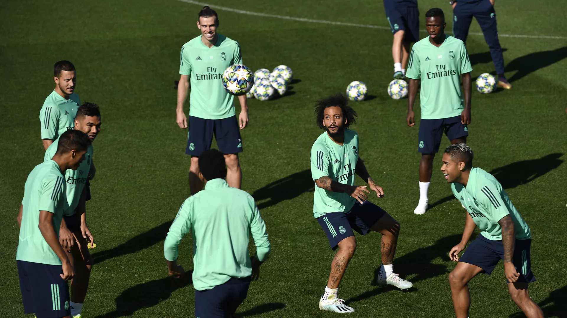 Real Madrid's French defender Raphael Varane, Real Madrid's Brazilian midfielder Casemiro, Real Madrid's Belgian forward Eden Hazard, Real Madrid's Welsh forward Gareth Bale, Real Madrid's Brazilian defender Marcelo Real Madrid's Brazilian forward Vinicius Junior and Real Madrid's Dominicans forward Mariano Diaz attend a training session at the Valdebebas training complex in the outskirts of Madrid, on September 30, 2019