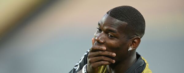 Полузащитник английского футбольного клуба Манчестер Юнайтед Поль Погба на тренировке в Кельне, Германия Полузащитник английского футбольного клуба Манчестер Юнайтед Поль Погба на тренировке в Кельне, Германия - اسپوتنیک افغانستان