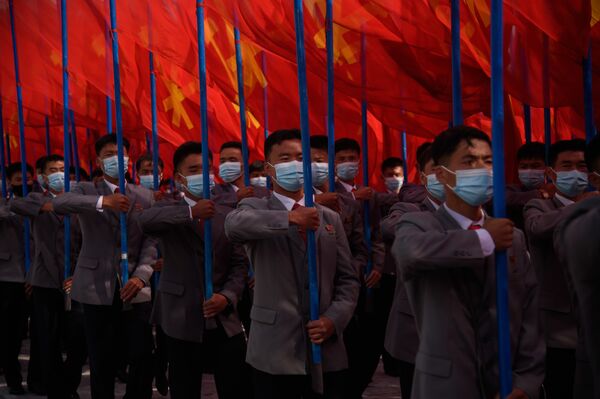 تظاهرات هزاران نفر با ماسک در کوریای شمالی - اسپوتنیک افغانستان  