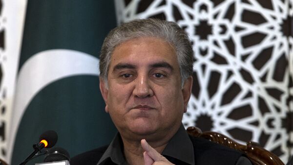 Pakistani Foreign Minister Shah Mahmood Qureshi speaks to reporters at the Foreign Ministry in Islamabad, Pakistan, Sunday, March 1, 2020 - اسپوتنیک افغانستان  