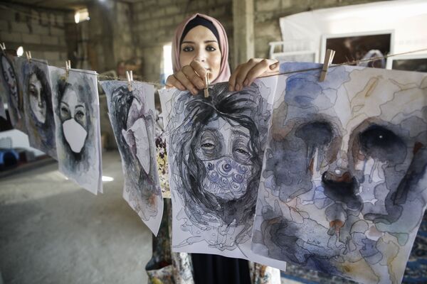 نقاش فلسطینی با کارهایش در یونس - اسپوتنیک افغانستان  