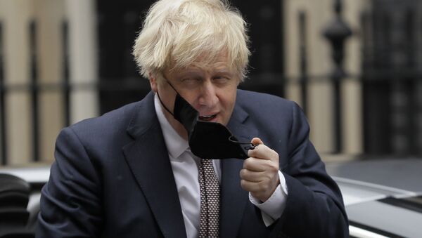 Премьер-министр Великобритании Борис Джонсон снимает маску - اسپوتنیک افغانستان  
