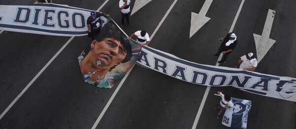 المشجعون يودعون كرة القدم الأرجنتيني دييغو مارادونا، بوينس ايروس، الأرجنتين 25 نوفمبر 2020 المشجعون يودعون كرة القدم الأرجنتيني دييغو مارادونا، بوينس ايروس، الأرجنتين 25 نوفمبر 2020 - اسپوتنیک افغانستان