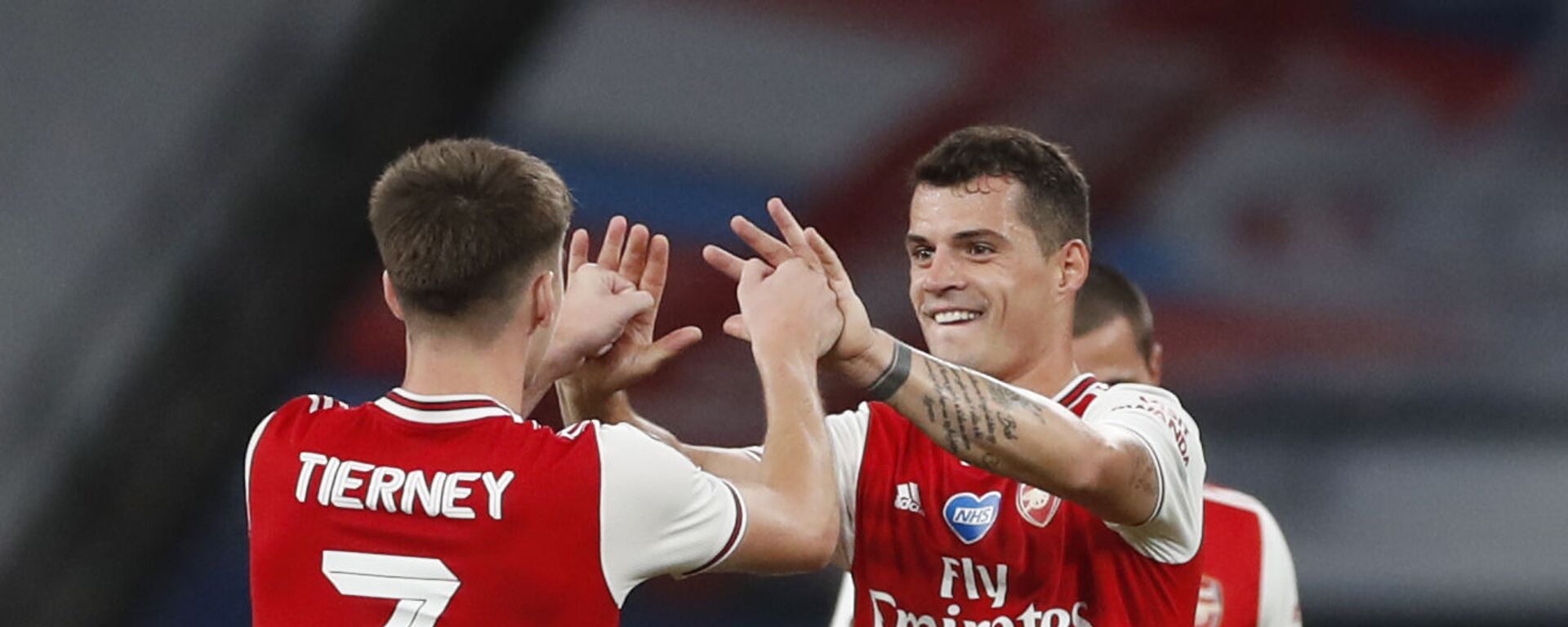Soccer Football - FA Cup Semi Final - Arsenal v Manchester City - Wembley Stadium, London, Britain - July 18, 2020 Arsenal's Granit Xhaka and Kieran Tierney celebrate after the match, as play resumes behind closed doors following the outbreak of the coronavirus disease (COVID-19) - اسپوتنیک افغانستان  , 1920, 14.03.2021