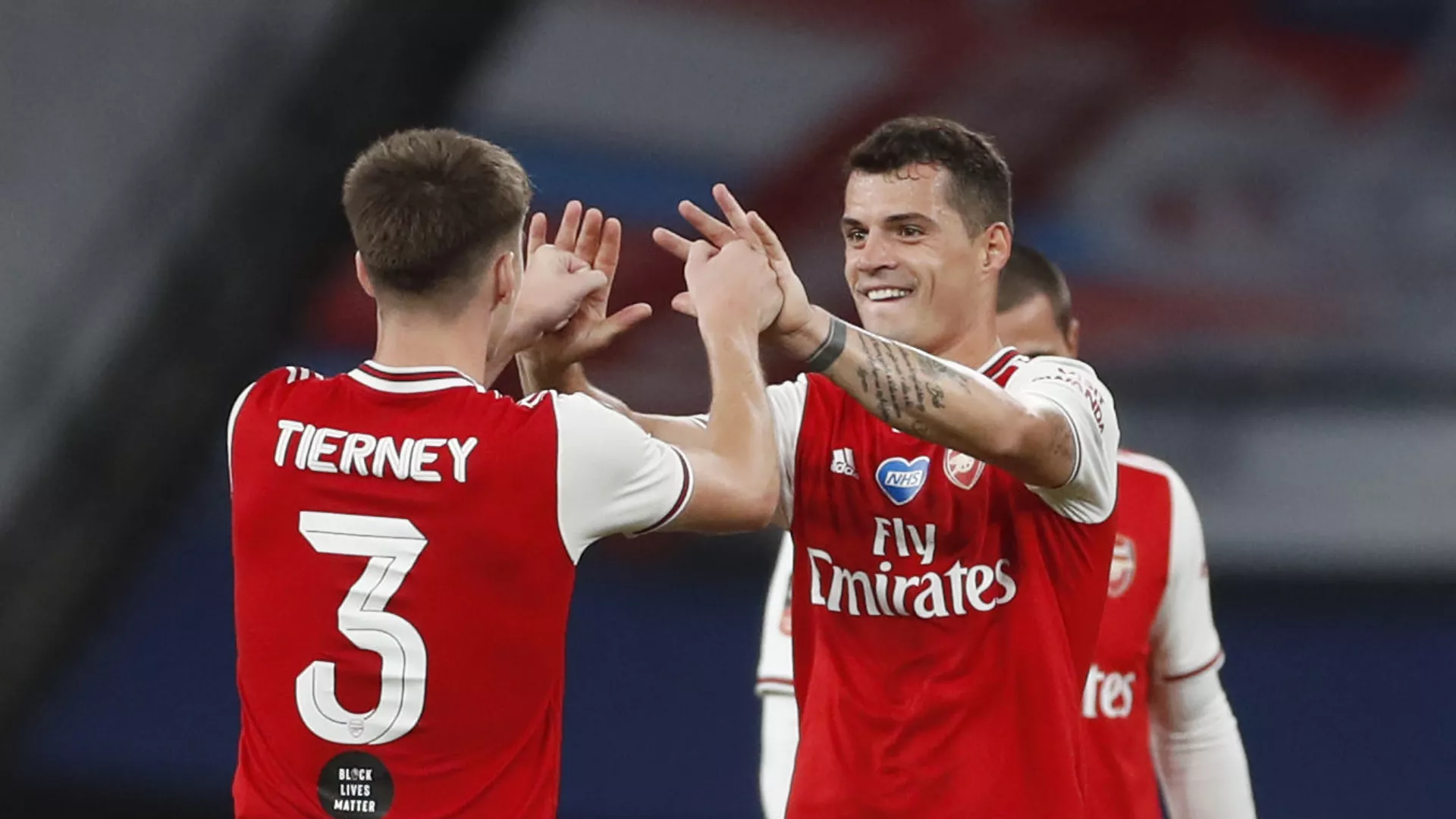 Soccer Football - FA Cup Semi Final - Arsenal v Manchester City - Wembley Stadium, London, Britain - July 18, 2020 Arsenal's Granit Xhaka and Kieran Tierney celebrate after the match, as play resumes behind closed doors following the outbreak of the coronavirus disease (COVID-19) Soccer Football - FA Cup Semi Final - Arsenal v Manchester City - Wembley Stadium, London, Britain - July 18, 2020 Arsenal's Granit Xhaka and Kieran Tierney celebrate after the match, as play resumes behind closed doors following the outbreak of the coronavirus disease (COVID-19) - اسپوتنیک افغانستان , 1920, 05.04.2022
