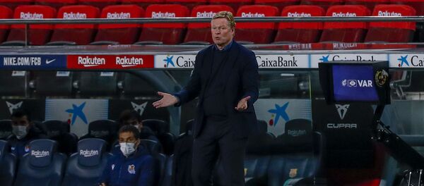 Barcelona's head coach Ronald Koeman gives instruction inside the box team area during the Spanish La Liga soccer match between FC Barcelona and Real Sociedad at the Camp Nou stadium in Barcelona, Spain, Wednesday, Dec. 16, 2020. Barcelona's head coach Ronald Koeman gives instruction inside the box team area during the Spanish La Liga soccer match between FC Barcelona and Real Sociedad at the Camp Nou stadium in Barcelona, Spain, Wednesday, Dec. 16, 2020. - اسپوتنیک افغانستان