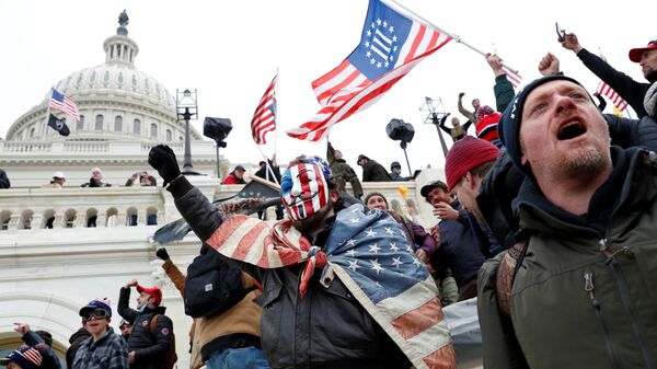 Protesters clash with Capitol police during a rally to contest the certification of the 2020 U.S. presidential election results by the U.S. Congress, at the U.S. Capitol Building in Washington, U.S, January 6, 2021. - اسپوتنیک افغانستان  