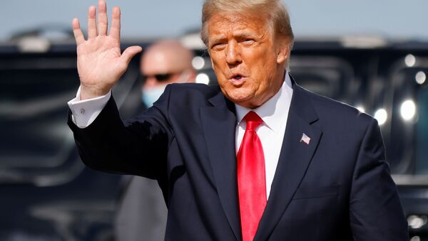 U.S. President Donald Trump waves as he arrives at Palm Beach International Airport in West Palm Beach, Florida, U.S., January 20, 2021. - اسپوتنیک افغانستان  