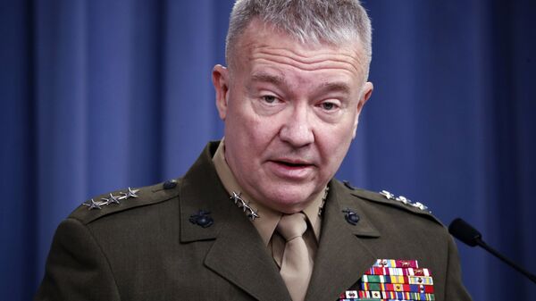 In this April1 14, 2018, file photo, then-Marine Lt. Gen. Kenneth Frank McKenzie speaks during a media availability at the Pentagon in Washington. McKenzie, the Marine general overseeing the U.S. war effort in Afghanistan says the Islamic State affiliate there has hopes of attacking the U.S. homeland. But McKenzie says the extremist group’s aspirations are being frustrated by American counterterrorism operations in its strongholds in northeastern Afghanistan.  - اسپوتنیک افغانستان  
