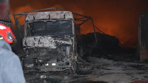 آتش سوزی در گمرک اسلام قعله؛ رانندگان ایرانی از دولت افغانستان جبران خسارات می‌خواهد - اسپوتنیک افغانستان  