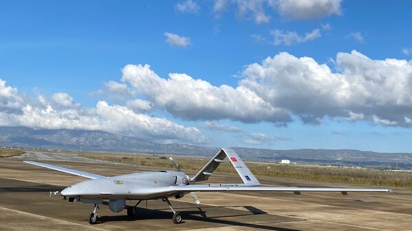 A Turkish-made Bayraktar TB2 drone is seen shortly after its landing at an airport in Gecitkala, known as Lefkoniko in Greek, in Cyprus, Monday, Dec. 16, 2019 - اسپوتنیک افغانستان  