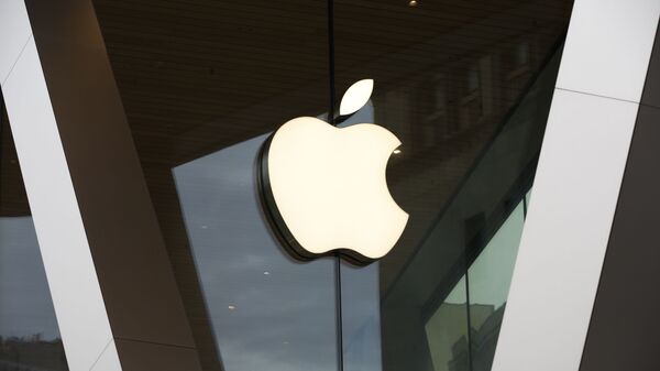 This Saturday, March 14, 2020 file photo shows an Apple logo on the facade of the downtown Brooklyn Apple store in New York. On Tuesday, Nov. 10, 2020 - اسپوتنیک افغانستان  