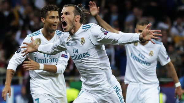Real Madrid's player Gareth Bale, center, celebrates a goal (File) - اسپوتنیک افغانستان  