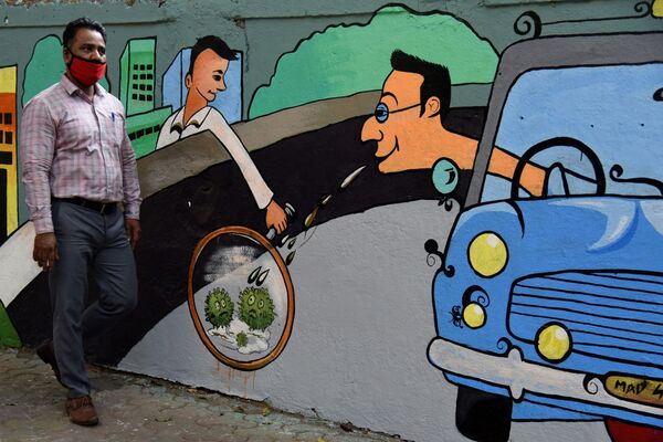 نقاشی های دیواری با موضوع ویروس کرونا در بمبئی هند. - اسپوتنیک افغانستان  