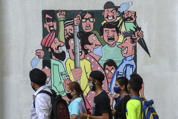 فاصله اجتماعی را مراعت کنید؛ نقاشی در ممبئی هند. - اسپوتنیک افغانستان  