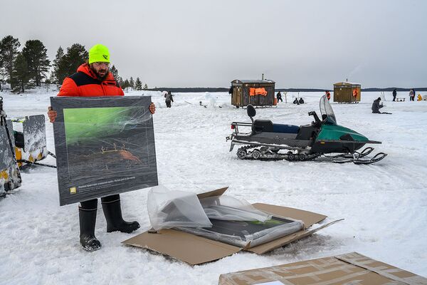 افتتاح اولین نمایشگاه زیر یخ در قطب شمال در دریای سفید. - اسپوتنیک افغانستان  