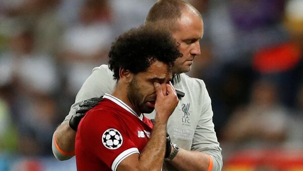 Soccer Football - Champions League Final - Real Madrid v Liverpool - NSC Olympic Stadium, Kiev, Ukraine - May 26, 2018 Liverpool's Mohamed Salah looks dejected as he is substituted off due to injury - اسپوتنیک افغانستان  