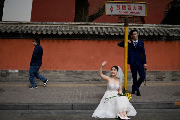 عکاسی زوج تازه عروسی کرده در پکن. - اسپوتنیک افغانستان  