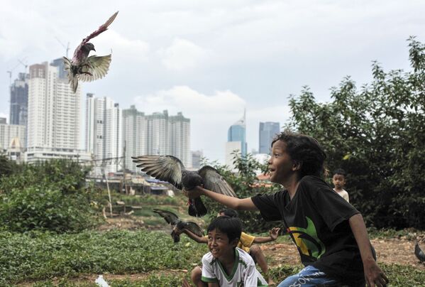 کودکان هنگام بازی در اندونزیا. - اسپوتنیک افغانستان  