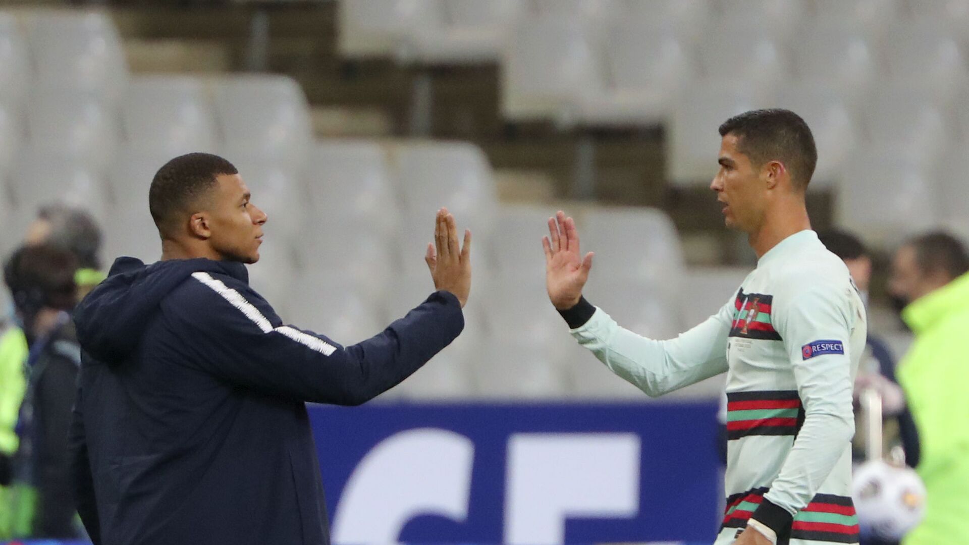 FILE - In this Sunday, Oct. 11, 2020 file photo France's Kylian Mbappe and Portugal's Cristiano Ronaldo, right, greet each other before the UEFA Nations League soccer match between France and Portugal at the Stade de France in Saint-Denis, north of Paris, France - اسپوتنیک افغانستان  , 1920, 24.08.2021