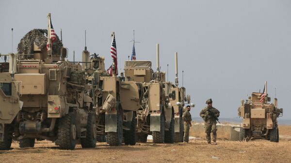 American military convoy stops near the town of Tel Tamr, north Syria, Sunday, Oct. 20, 2019.  - اسپوتنیک افغانستان  