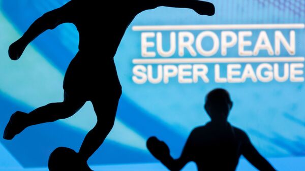 Metal figures of football players are seen in front of the words European Super League in this illustration taken April 20, 2021 - اسپوتنیک افغانستان  