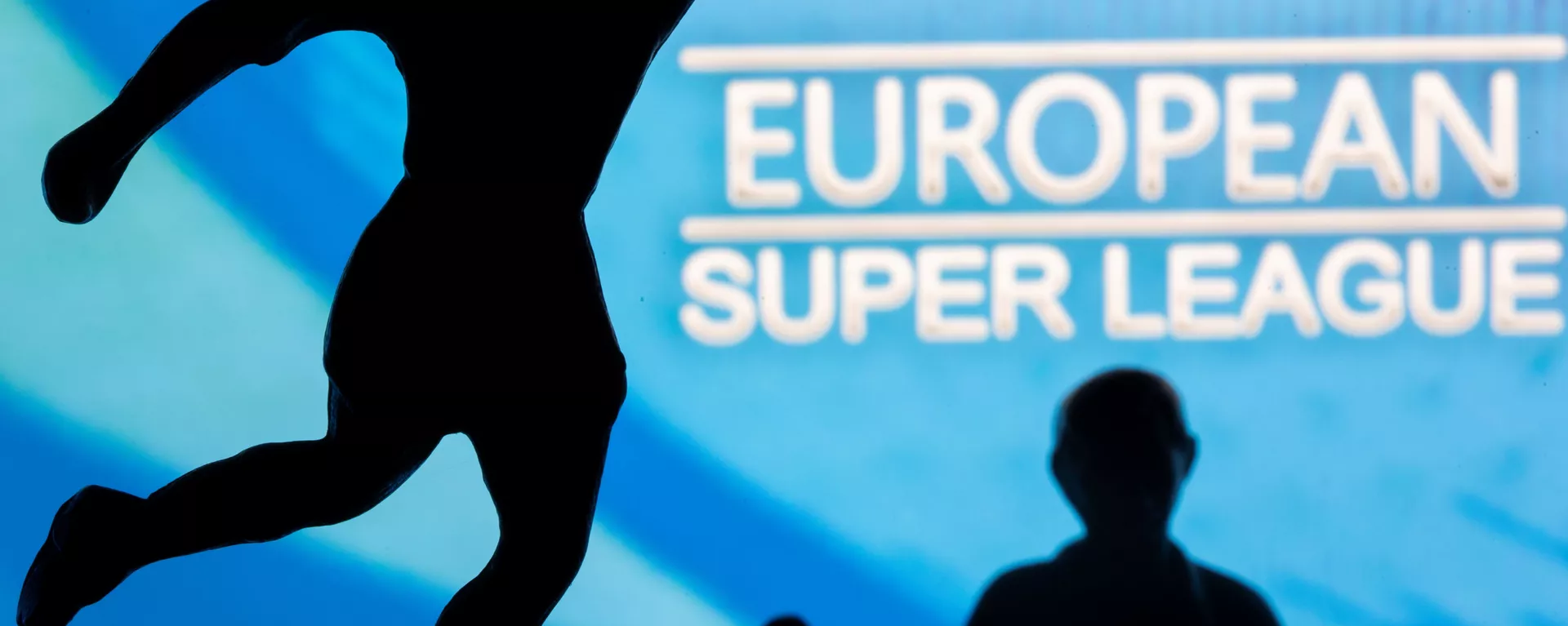 Metal figures of football players are seen in front of the words European Super League in this illustration taken April 20, 2021 - اسپوتنیک افغانستان  , 1920, 16.08.2021