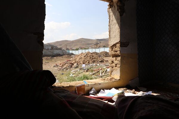 مخروبه‌های ساختمان‌ها در نزدیکی محل انفجار موتربم - اسپوتنیک افغانستان  