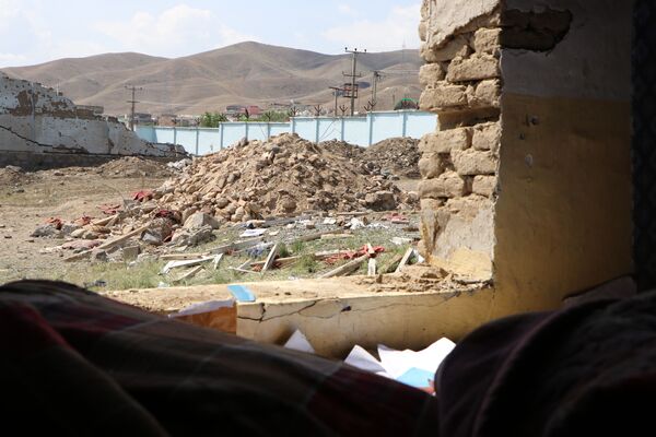 مخروبه‌های ساختمان‌ها در نزدیکی محل انفجار موتربم - اسپوتنیک افغانستان  
