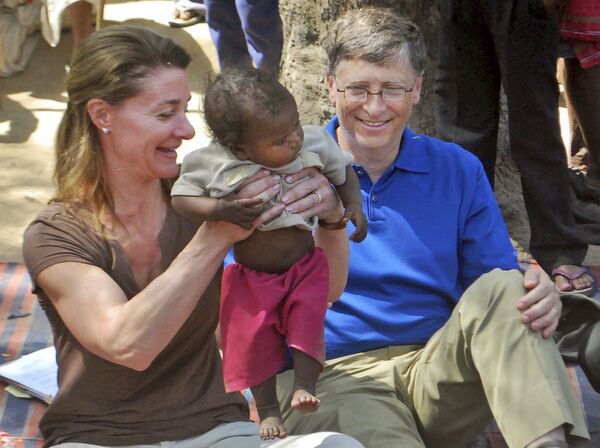 بیل گیتس و همسرش ملیندا  در هند/ سال 2011 - اسپوتنیک افغانستان  