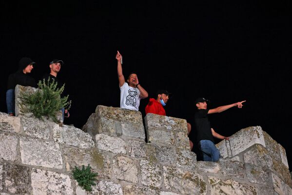 جوانان فلسطینی در درگیری با نیروهای امنیتی اسرائیل در بیت المقدس. - اسپوتنیک افغانستان  