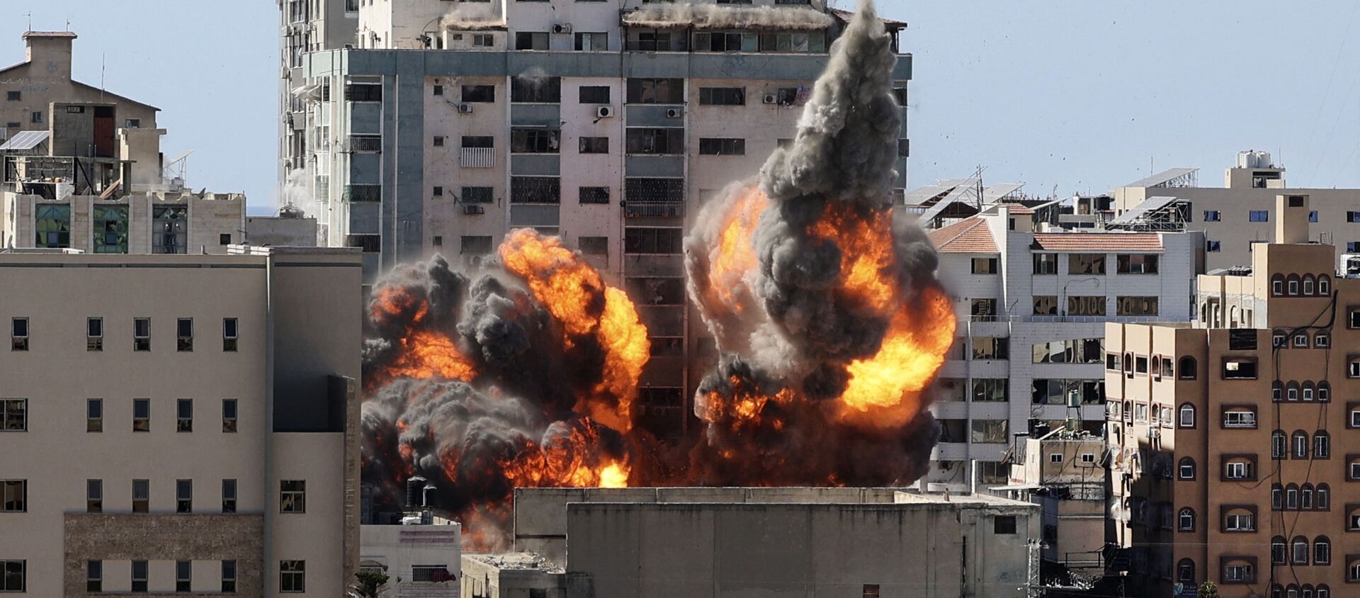 ВВС Израиля нанесли авиаудары по высотке в Газе, в которой расположены офисы американского информагентства Associated Press и катарского телеканала «Аль-Джазира» - اسپوتنیک افغانستان  , 1920, 17.05.2021