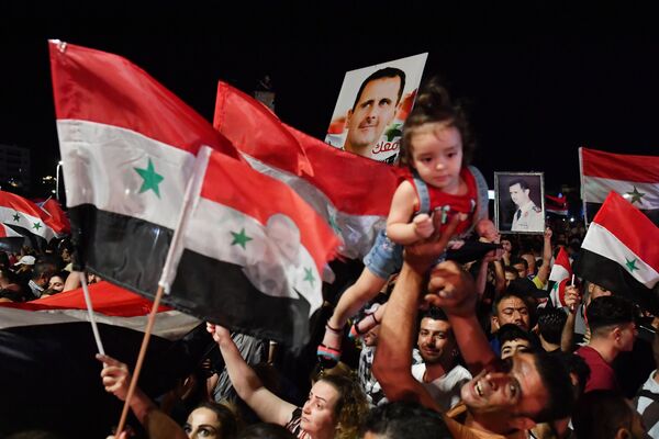جشن پیروزی بشار اسد در انتخابات ریاست جمهوری در سوریه - اسپوتنیک افغانستان  