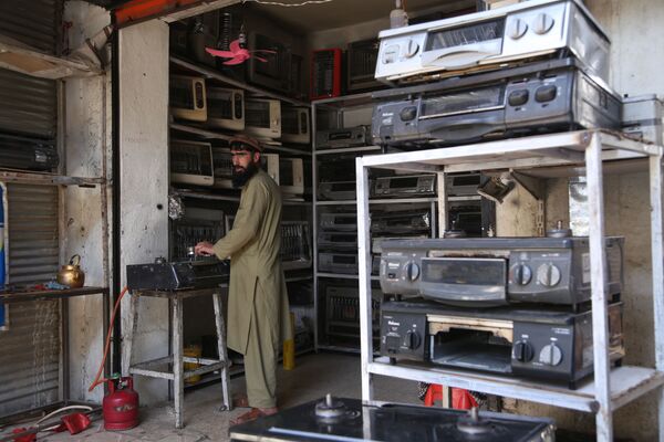 فروشنده وسایل الکترونیکی در سرای چنداول - اسپوتنیک افغانستان  
