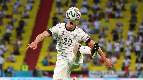 Игрок сборной Германии Робин Госенс в матче против Франции - اسپوتنیک افغانستان  