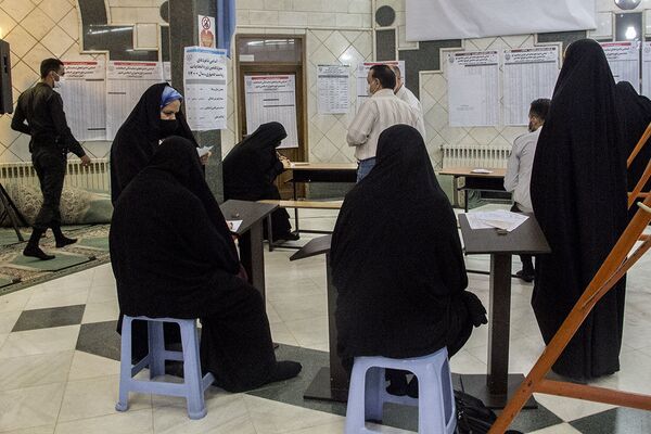 На избирательных участках в Иране - اسپوتنیک افغانستان  