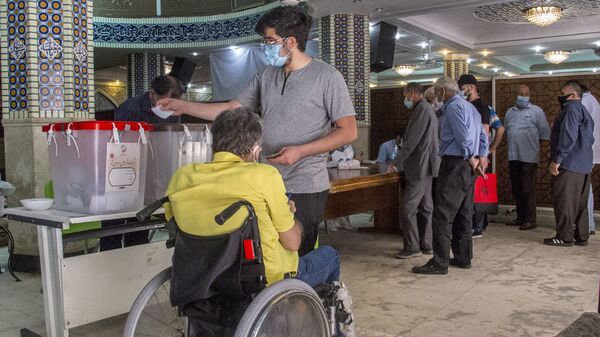 На избирательных участках в Иране - اسپوتنیک افغانستان  