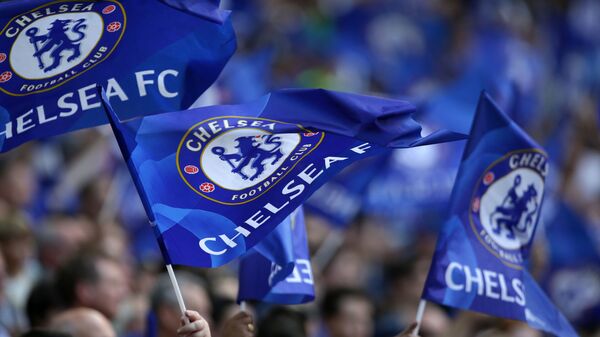 Cheslea supporters wave flags in the crowd ahead of the English FA Community Shield football match between Arsenal and Chelsea at Wembley Stadium - اسپوتنیک افغانستان  