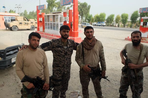 نیروهای ارتش در ناحیه هفتم شهر قندهار درحال جنگ با طالبان. - اسپوتنیک افغانستان  