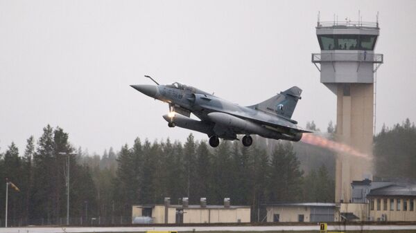 A French Mirage 2000 jet fighter takes off during the Arctic Challenge Exercise (ACE 2015) organized by Sweden, Finland and Norway in Rovaniemi, Finland on May 27, 2015.  - اسپوتنیک افغانستان  