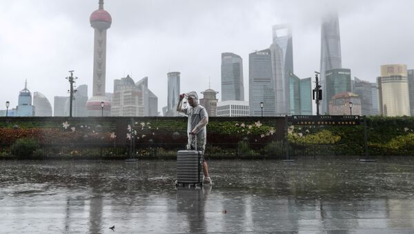 توفان اینفا رفت و آمد را در شانگهای فلج کرد - اسپوتنیک افغانستان  