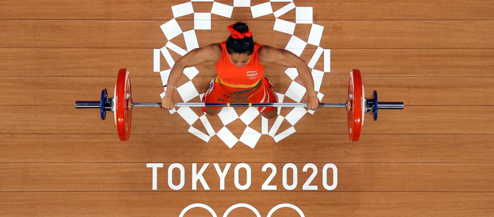 Tokyo 2020 Olympics - Weightlifting - Women's 49kg - Group A - Tokyo International Forum, Tokyo, Japan - July 24, 2021.  Mirabai Chanu Saikhom of India in action. Pool via REUTERS/Chris Graythen - اسپوتنیک افغانستان  , 1920, 25.07.2021