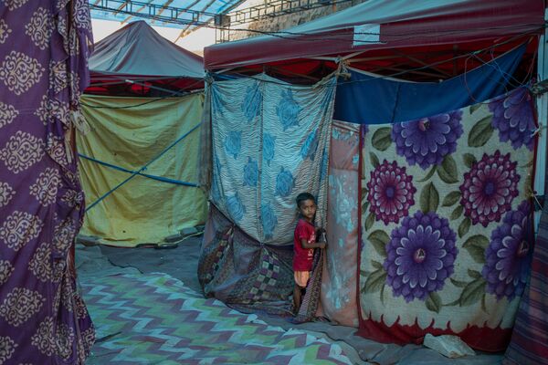 بهترین عکس های این هفته اسپوتنیک/کمپ پناهندگان در هند - اسپوتنیک افغانستان  