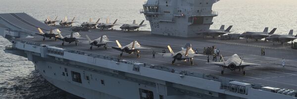 F-35B Lightning II Joint Strike Fighters assigned to Marine Fighter Attack Squadron (VMFA) 211 The Wake Island Avengers  and the United Kingdom's Lightning 617 Squadron shortly after embarking onboard HMS Queen Elizabeth on 22 September, 2020, off the coast of the United Kingdom. - اسپوتنیک افغانستان  